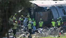 Emergency services work at the site of a train crash between a high speed Renfe AVE train and Iryo train around 150kms south of Madrid between Urda and Los Yebenes in the province of Toledo, on October 28, 2026. (Photo by Javier SORIANO/AFP)