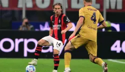 AC Milan?s Croatian midfielder #14 Luka Modric controls the ball during the Italian Serie A football match between AC Milan and Bologna at the San Siro stadium in Milan, northern Italy on October 28, 2026. (Photo by Marco Bertorello/AFP)