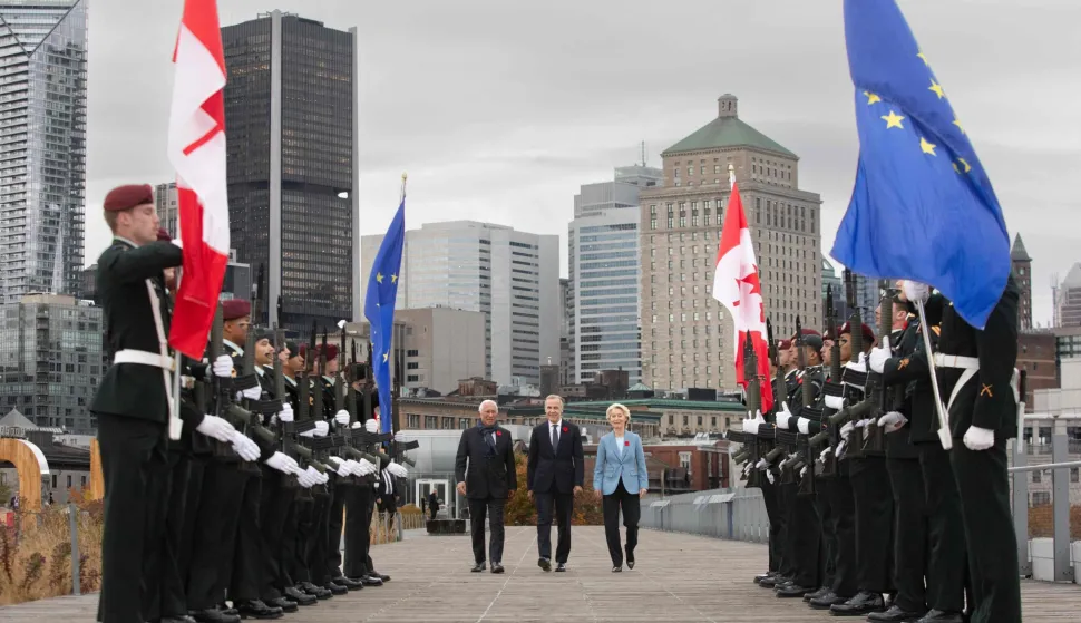 TOPSHOT - Canadian Prime Minister Mark Carney (C), European Council President Ant?nio Costa (L) and European Commission President Ursula von der Leyen (R) arrive during the welcome ceremony at the 21st EU-Canada summit in Montreal, Quebec, Canada on October 30, 2026. Squeezed by the United States and China, the European Union and Canada are set to unveil Friday a series of deals -- from critical minerals to artificial intelligence -- designed to boost their ties to an unprecedented level. EU chiefs Ursula von der Leyen and Antonio Costa will meet with Canada's Mark Carney in Montreal on the second day of a summit that also features talks between Canadian ministers and senior EU officials. (Photo by Alexis Aubin/AFP)